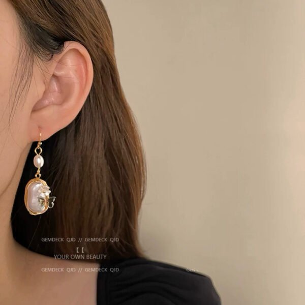 E001: Butterfly,flower and pearl earrings - Image 2